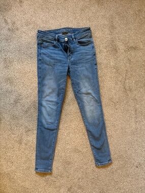 American Eagle Outfitters Blue Denim Jeans with Tan Stitching